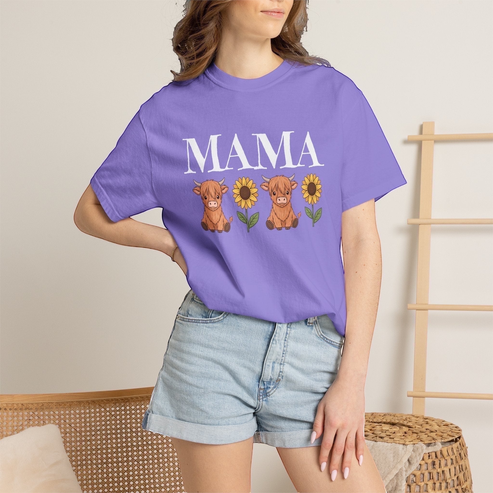 LilLlamaBean Mama Highland Cow Flower T-Shirt in purple cotton with cute cow and sunflower graphic.