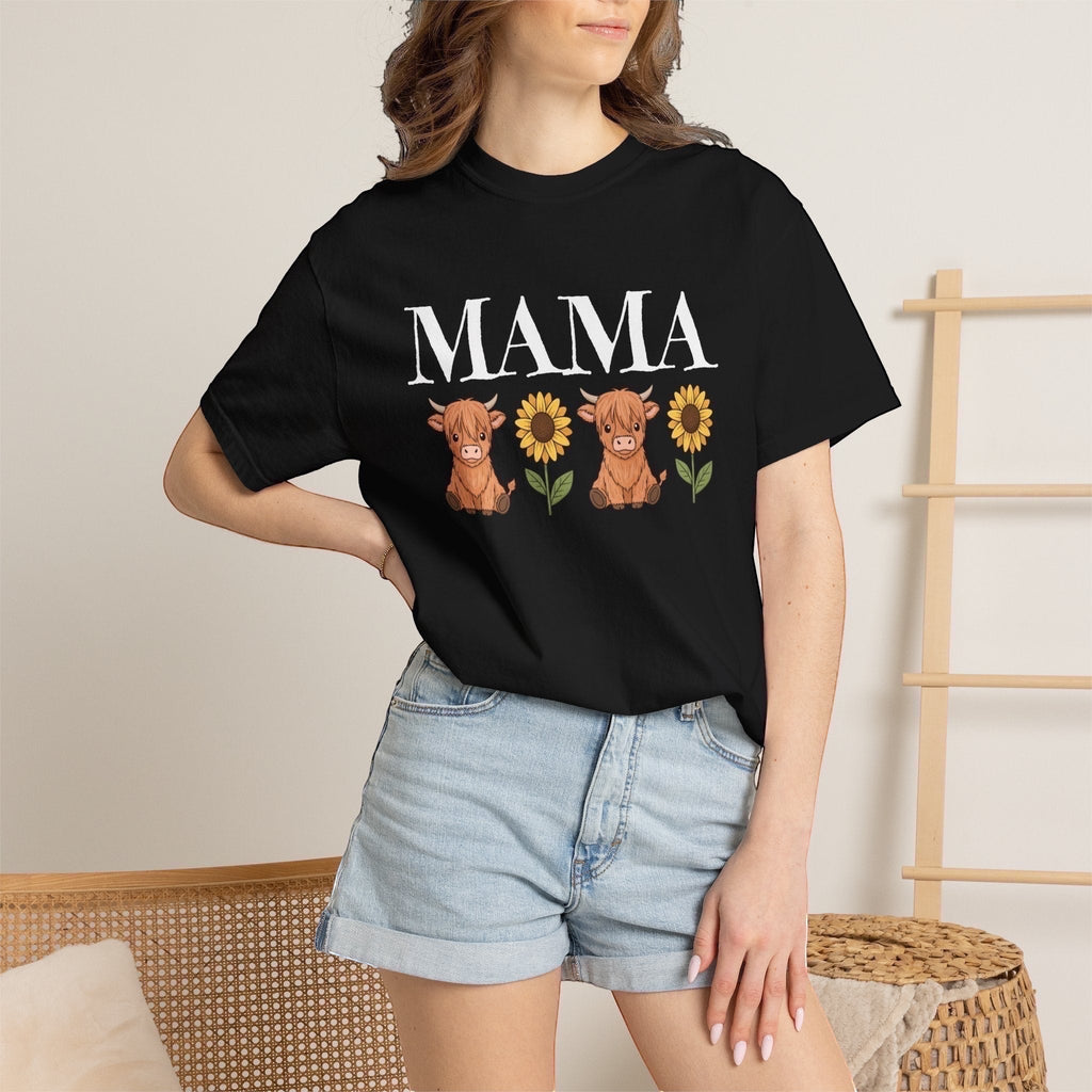 LilLlamaBean black cotton t-shirt with "MAMA" text and two highland cows with sunflowers graphic.
