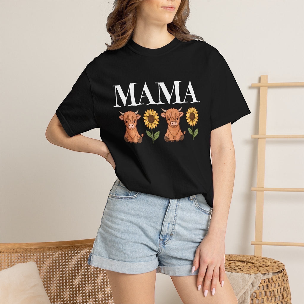 LilLlamaBean black cotton t-shirt with "MAMA" text and two highland cows with sunflowers graphic.