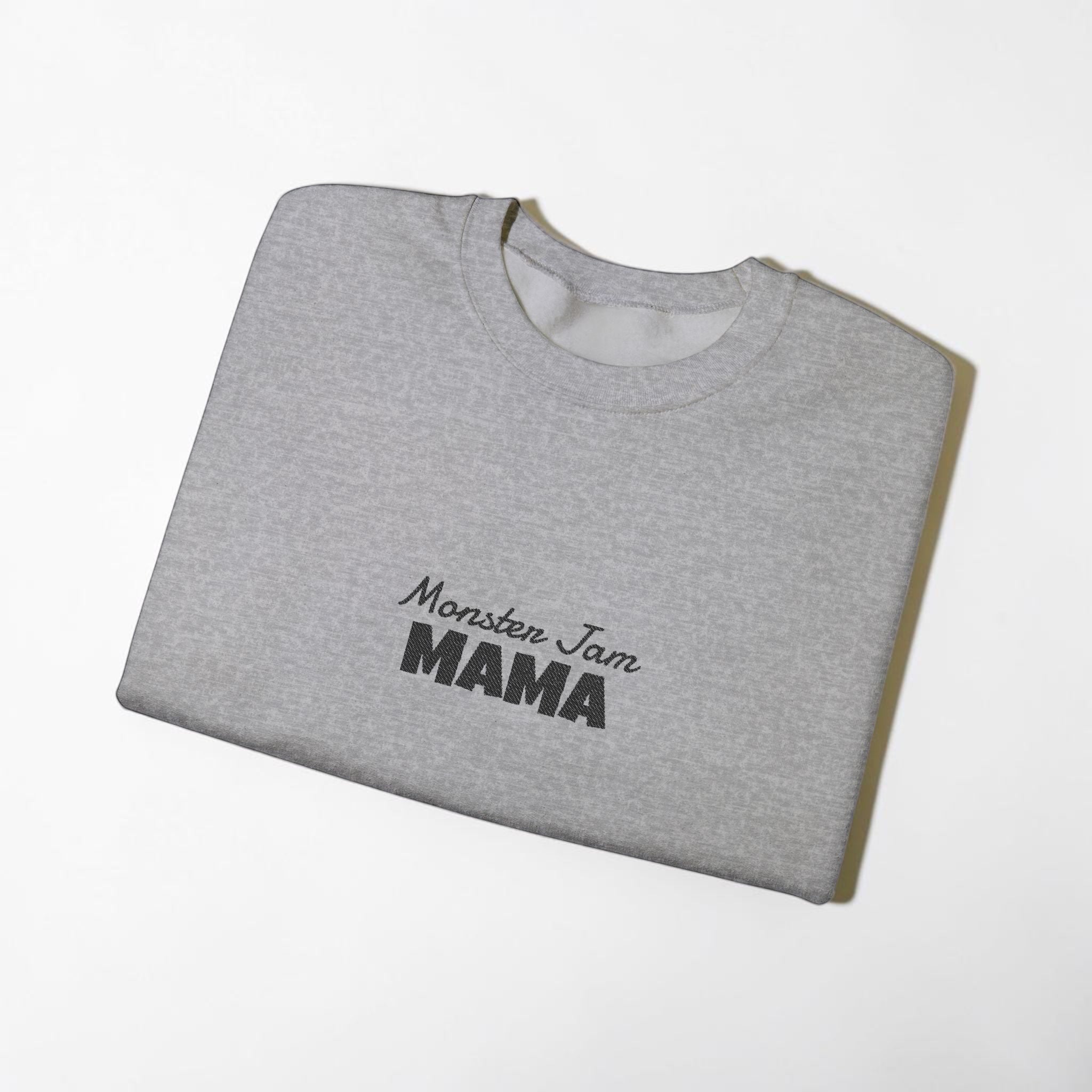 LilLlamaBean grey crewneck sweatshirt with embroidered "Monster Jam MAMA" text. Made of 50% cotton, 50% polyester.