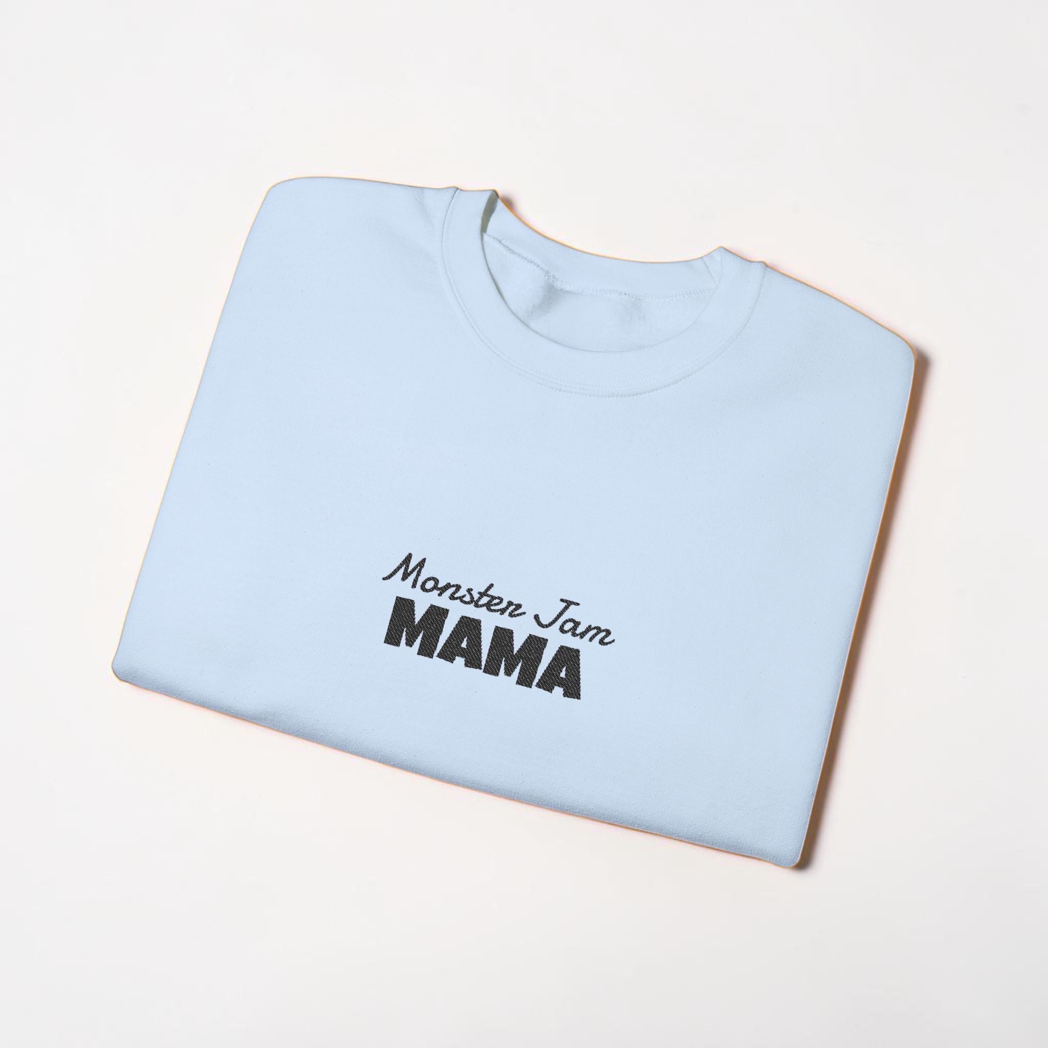 LilLlamaBean light blue crewneck sweatshirt with embroidered "Monster Jam MAMA" text in black.